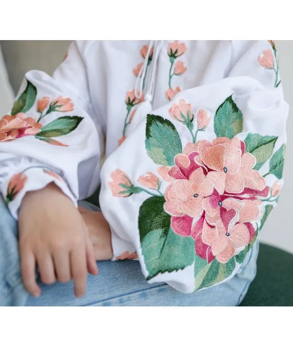 Girl's embroidered blouse with hydrangeas