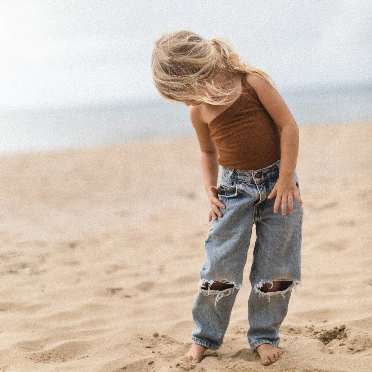 RAISED BY WATER - Shop Kai Blue x RBW: Kids One Strap Bodysuit | Kauai Clay